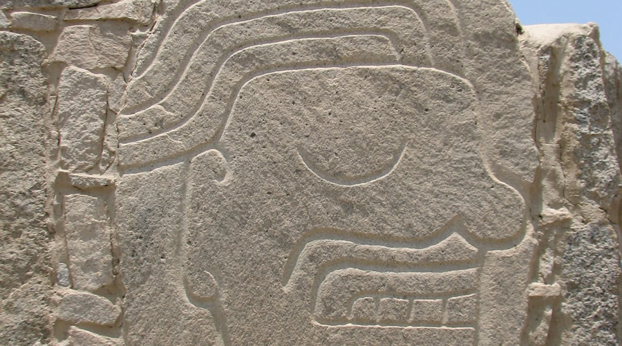 Carved stone warriors at Cerro Sechín near Casma