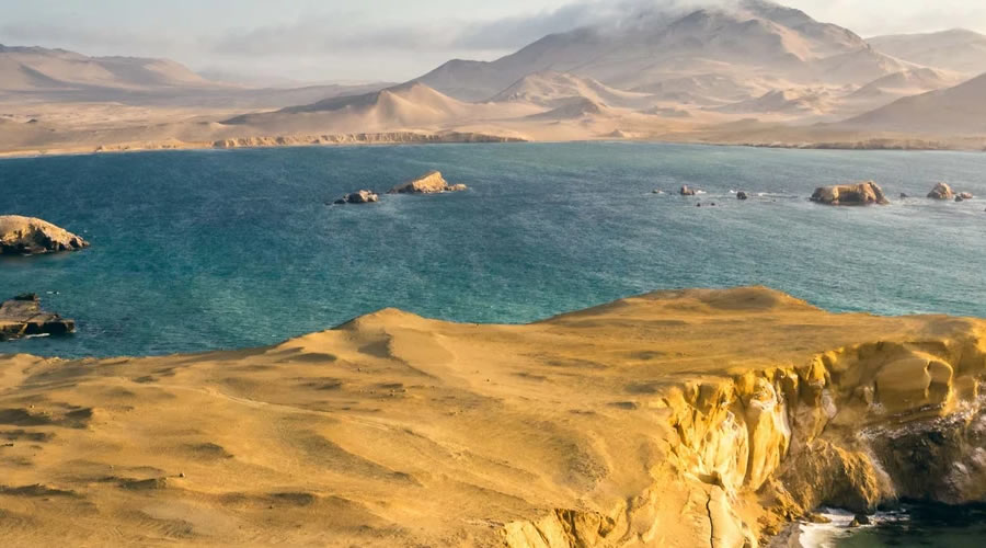 Red beach and cliffs of the Paracas National Reserve, Peru
