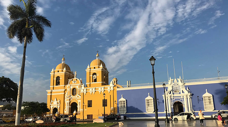 Colorful colonial mansions on the Plaza de Armas of Trujillo